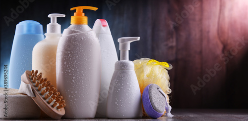 Plastic contaiers of shampoos and shower gels photo