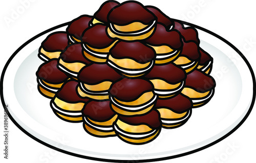 A mound of chocolate dipped, cream-filled profiteroles on a white plate.