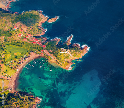 Top down view from flying drone of Port de Girolata.Stuning summer scene of Corsica island, France, Europe. Picturesque Mediterranean seascape. Traveling concept background..