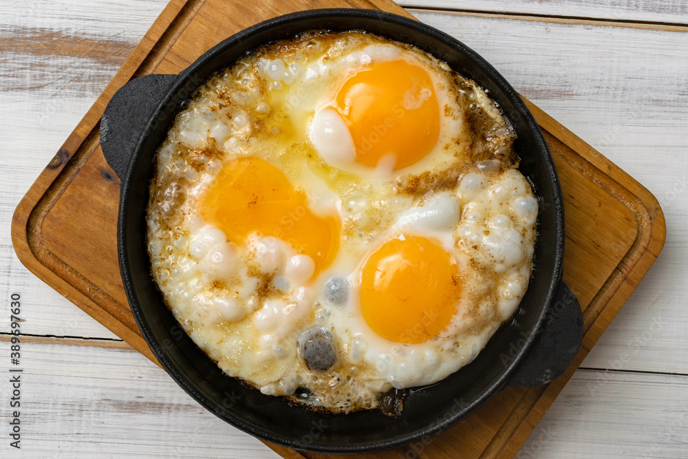 casually cooked scrambled eggs in a skillet casually cooked scrambled eggs in a skillet