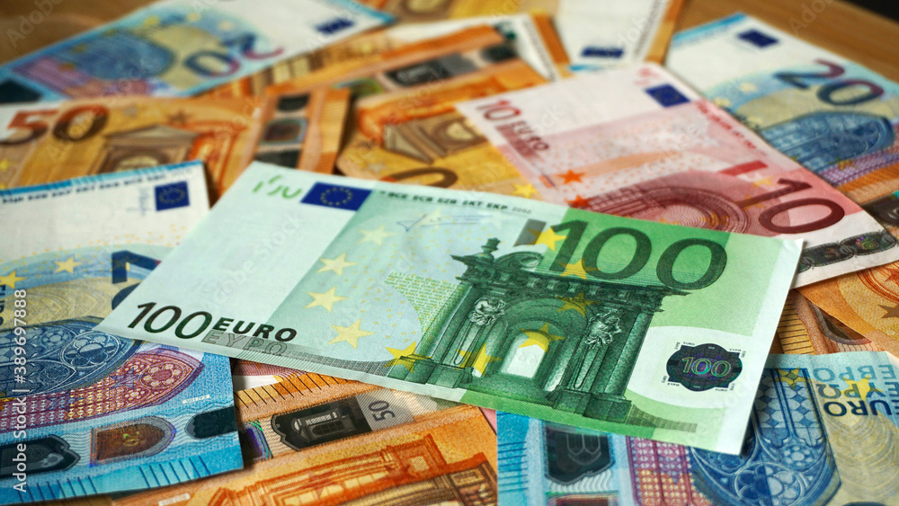 pile of paper euro banknotes as part of the united country's payment system pile of paper euro banknotes as part of the united country's payment system