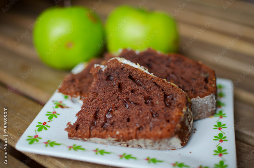 Chocolate cake with green apples