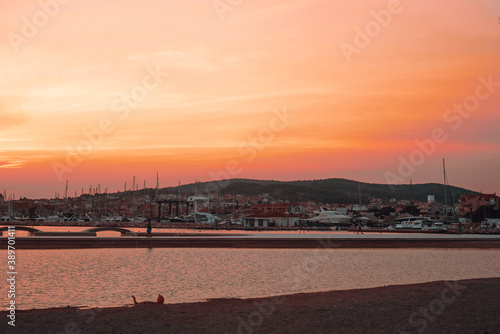 Sunset in Croatia. Evening city of Vodice. The sun sets into the sea. © MoreThanProd