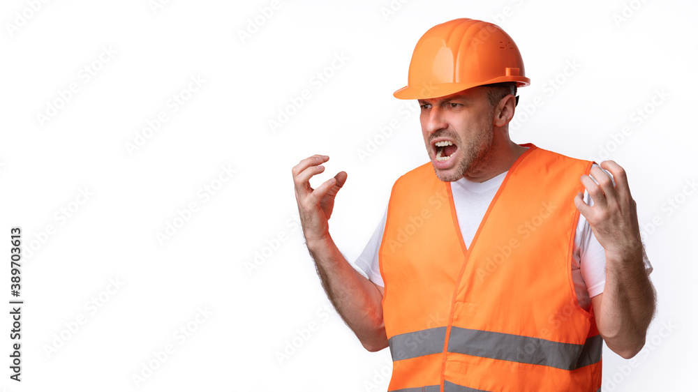 Mad Construction Worker Shouting Emotionally Standing Over White Background, Panorama Mad Construction Worker Shouting Emotionally Standing Over White Background, Panorama