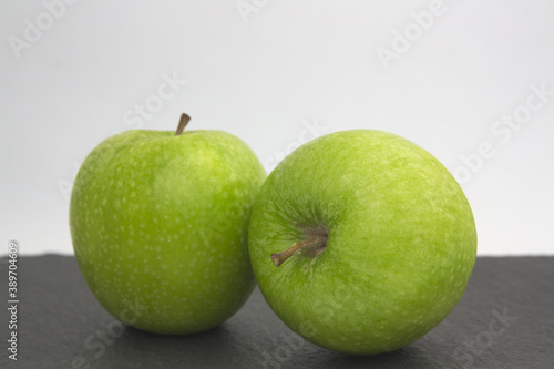 Green apples with white background and copy space