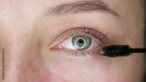 Eyelash Care Treatment Procedures, Staining, Curling, Laminating and Extension for Lashes. Beauty Model with Long Eyelashes. Skincare, Spa and Wellness. Close up.
