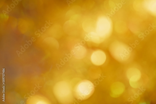 abstract bokeh background. christmas bokeh. Yellow blurred background. golden glow