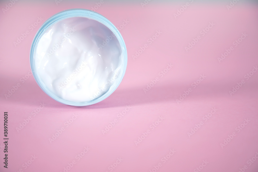 face cream on the pink table face cream on the pink table