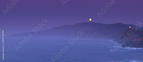 Dusk with the moon on Mount Jaizkibel on the coast of Gipuzkoa, Euskadi photo