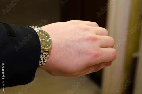 Businessman looking at his watch