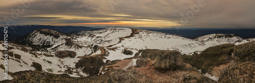 Panoramic dawn snowy Urbion peaks and mountain in Soria (Spain) photo