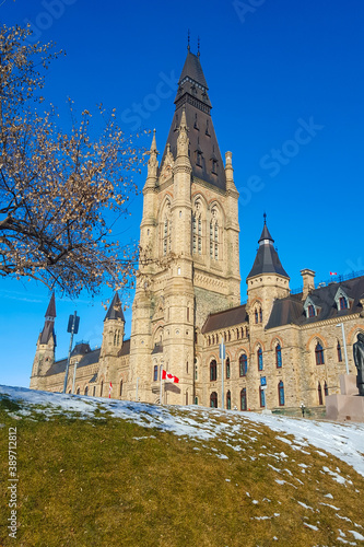 Parliament Hill Ottawa on a beautiful winter day with snow and blue skie