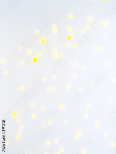 The golden shiny side's or boke on a white background. Merry Christmas and happy New Year. Christmas background.