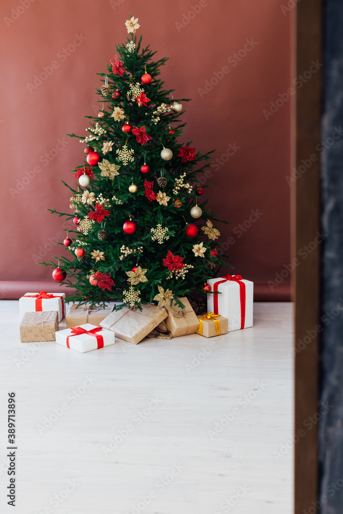 decoration decoration garland Christmas tree with gifts for the new year interior