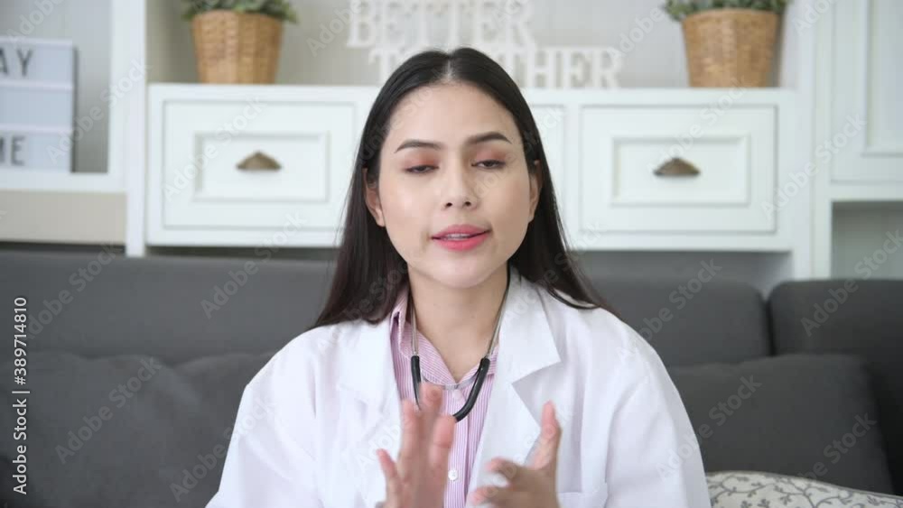 Female doctor making video call on social network with patient consulting about health problems. Female doctor making video call on social network with patient consulting about health problems.