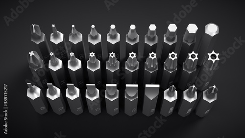 Different interchangeable screwdriver bits. photo