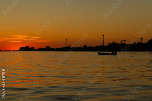 sunset over the river © Ioan