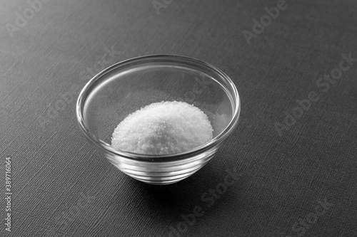 food salt in a glass transparent plate