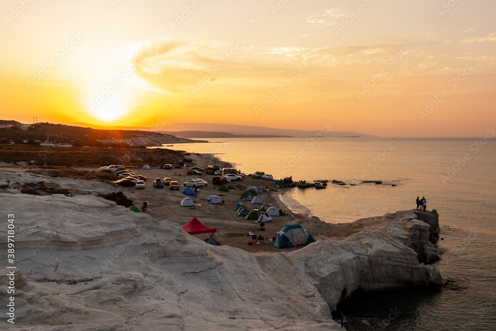 Izmir Turkey; Sunrise at Deliklikoy beach of Çeşme. The bay has been declared a geosite area due to its rare rock structure.