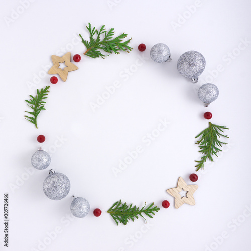 Creative concept holiday celebration photo of christmas wreath tree toys balls decoration on white background.