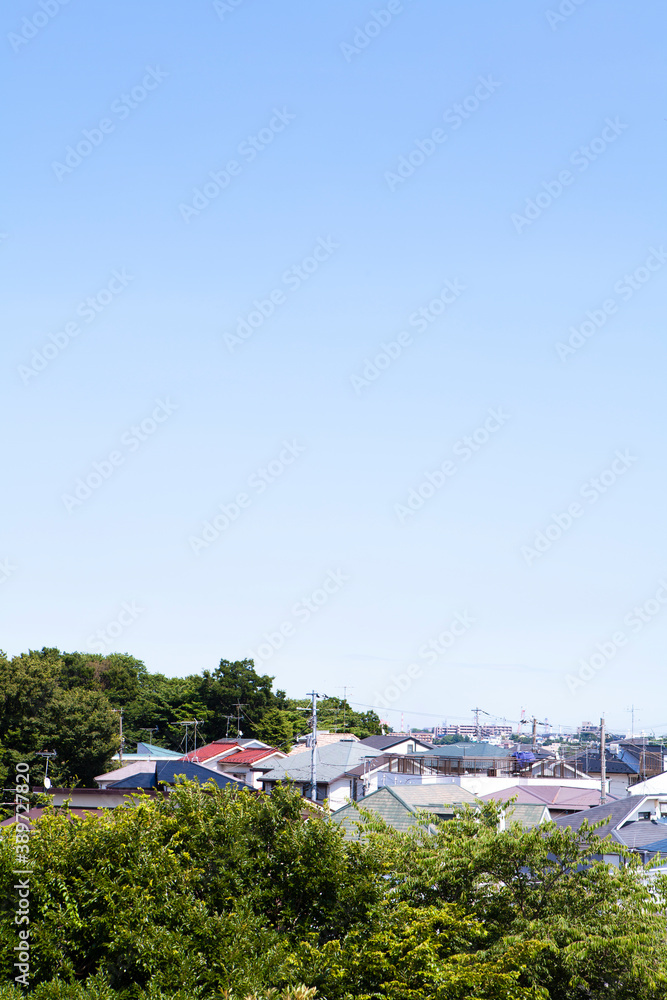 Fototapeta premium 住宅街と青空