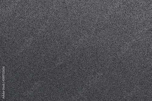 Black  hard plastic material with rough pressing texture. Hard grey texture. Metal hoarfrost texture.
