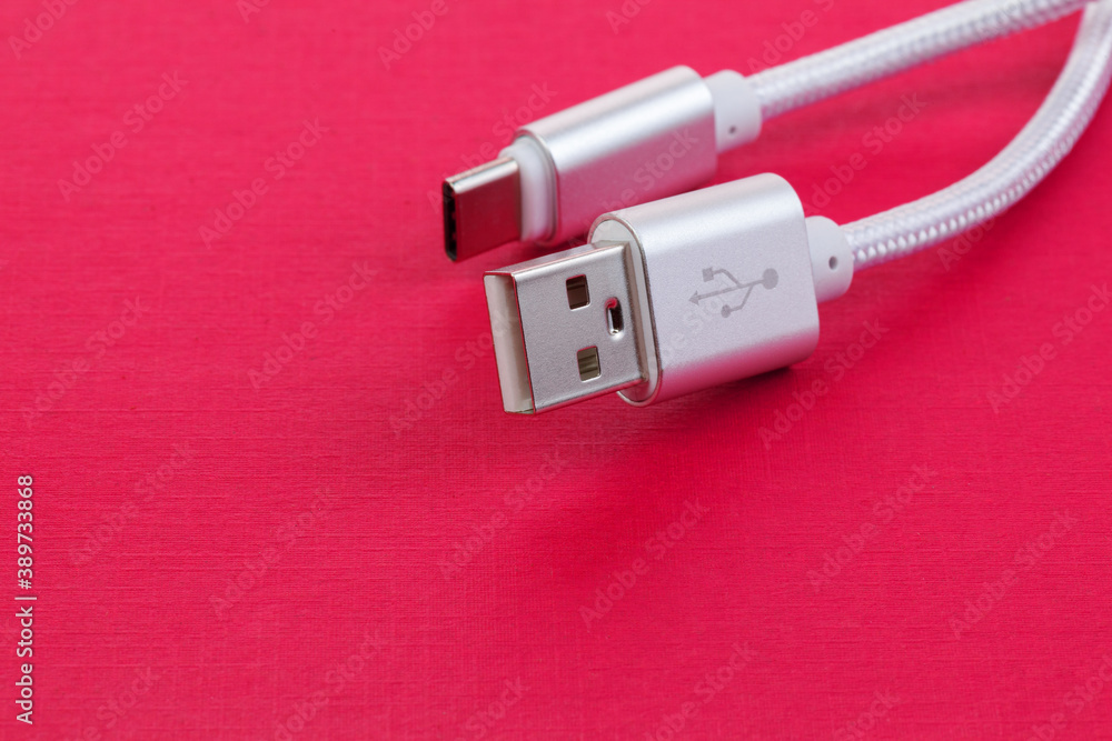 USB Data & Power Cable on red background. Close up USB Data & Power Cable on red background. Close up
