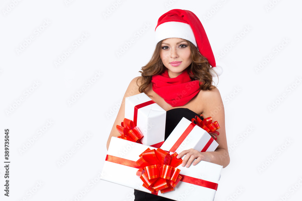 Portrait of woman santa's helper with gifts on a white. Portrait of woman santa's helper with gifts on a white.