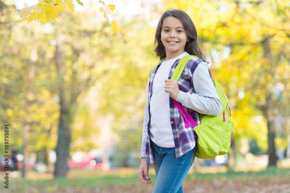 happy teenage kid in autumn forest with beautiful seasonal nature carry school bag, childhood happy teenage kid in autumn forest with beautiful seasonal nature carry school bag, childhood