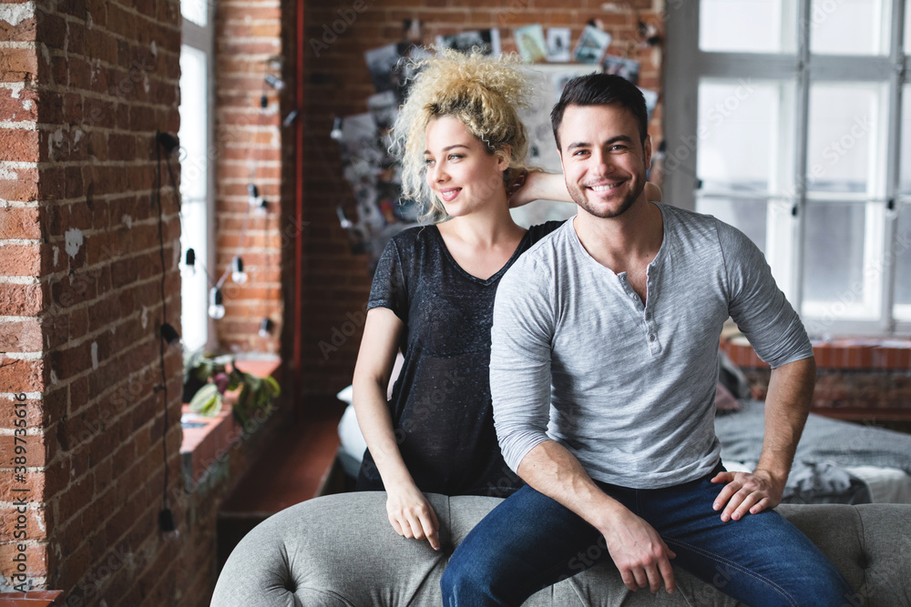 Obraz premium Happy cute couple at home. Good time together.