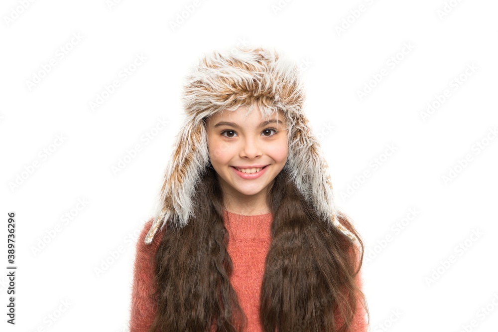 unseasonably warm. last trends for this winter. happy kid wear earflap hat. in christmas mood. little girl long hair isolated on white. warm and cosy. perfect look for cold weather unseasonably warm. last trends for this winter. happy kid wear earflap hat. in christmas mood. little girl long hair isolated on white. warm and cosy. perfect look for cold weather