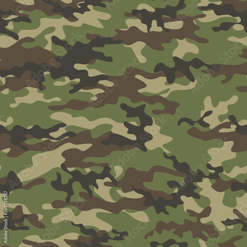  Camouflage pattern seamless green background light design on textiles. Forest background.