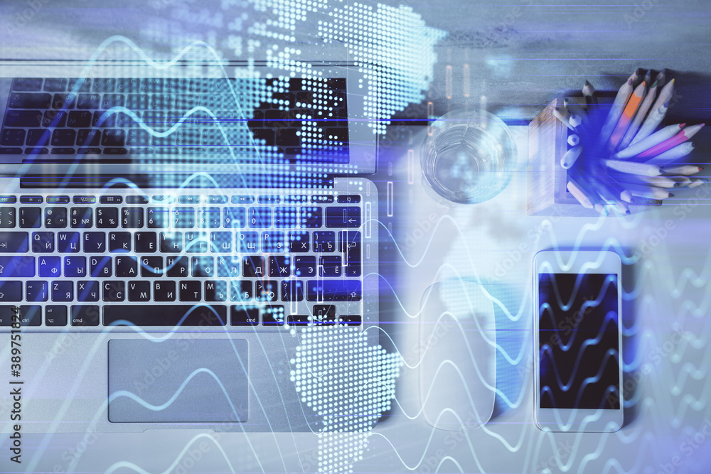 Obraz premium Multi exposure of forex graph drawing over desktop background with computer. Concept of financial analysis. Top view.