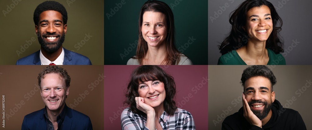 Group of people in front of a colored background Group of people in front of a colored background