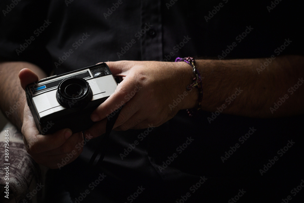 person holding a camera person holding a camera