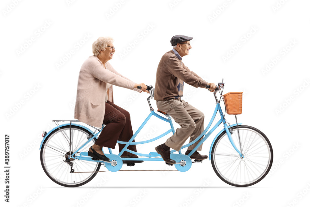 Obraz premium Elderly man and woman riding a blue tandem bicycle