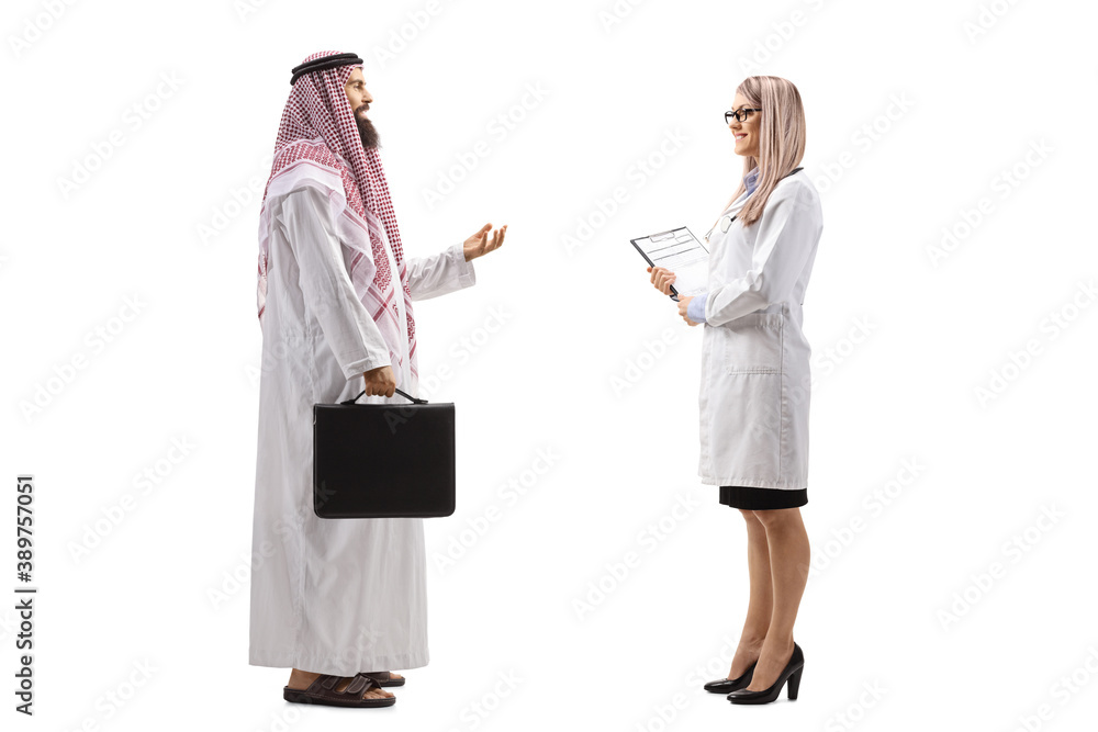 Full length profile shot of an arab businessman and a female doctor talking Full length profile shot of an arab businessman and a female doctor talking