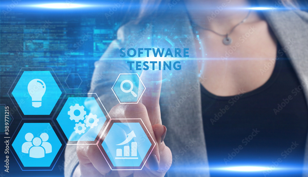 Business, Technology, Internet and network concept. Young businessman working on a virtual screen of the future and sees the inscription: Software testing Business, Technology, Internet and network concept. Young businessman working on a virtual screen of the future and sees the inscription: Software testing