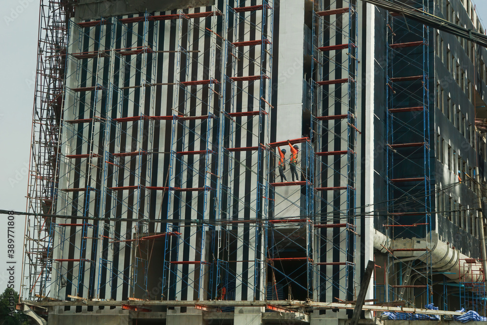 Safety first, seat belts. Construction site. Construction workers