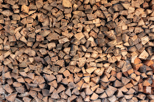 background of firewoods in a woodshed