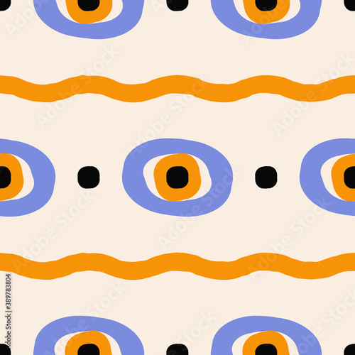 Abstract seamless pattern in ethnic style. Trendy background with geometric ornament, wavy lines and eye like shapes photo