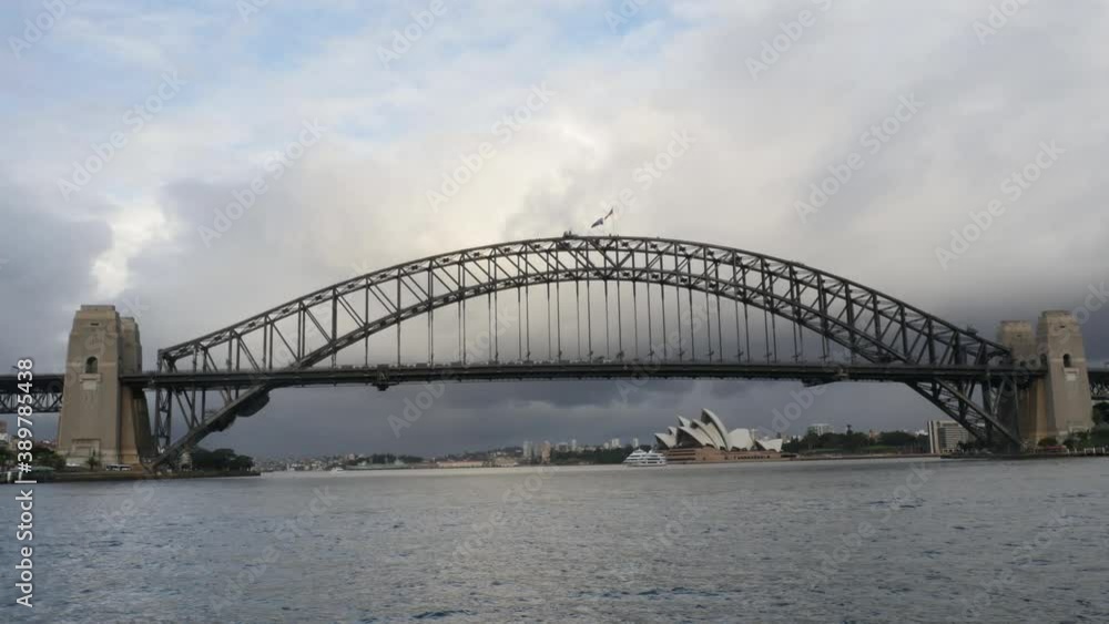 Sydney Harbour Bridge and Opera House with Ferry / Ship in Sydney Australia shot in 4k high resolution Sydney Harbour Bridge and Opera House with Ferry / Ship in Sydney Australia shot in 4k high resolution