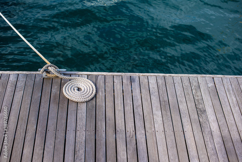 Close up shot of rope of boat attached to dockin station