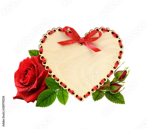 Wooden heart with red ribbo...
