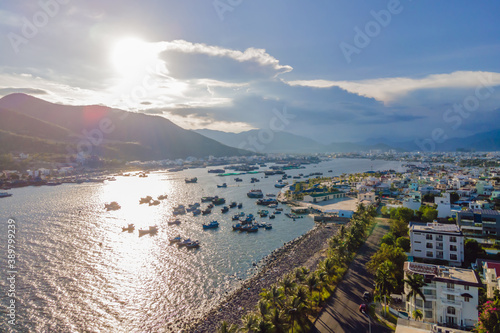 Mountains, river and city of Nha Trang, view from a drone © galitskaya