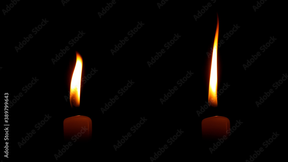 candle flame isolated on black background, buddhist holy day candle flame isolated on black background, buddhist holy day