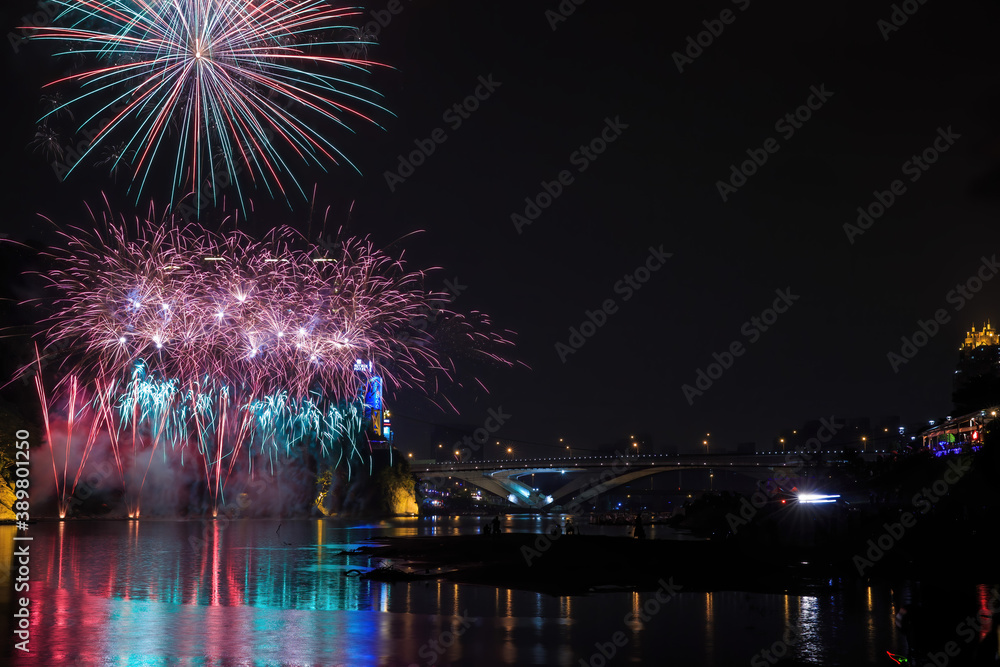 Dusk view of the Bitan Suspension Bridge with fireworks at Xindian District Dusk view of the Bitan Suspension Bridge with fireworks at Xindian District