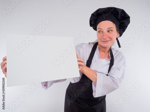 A woman cook with a funny e...