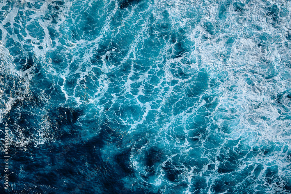 Aerial view to waves in ocean Splashing Waves. Blue clean wavy sea water Aerial view to waves in ocean Splashing Waves. Blue clean wavy sea water