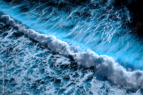Aerial view to waves in ocean Splashing Waves. Blue clean wavy sea water